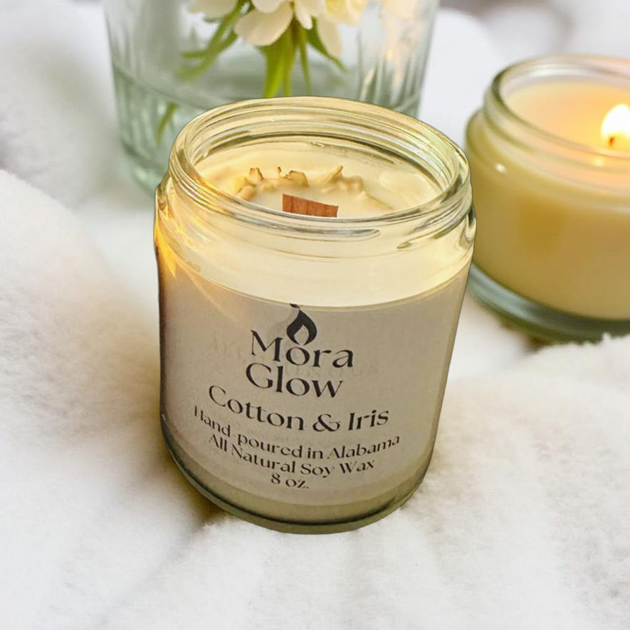 Cotton & Iris soy wax candle in a clear 8 oz. jar, fresh and floral home fragrance.